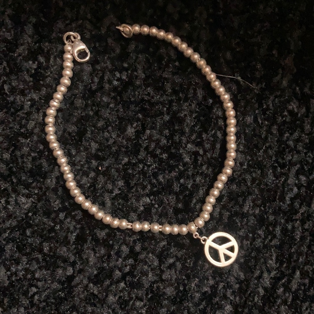 Authentic Tiffany and company peace sign bracelet